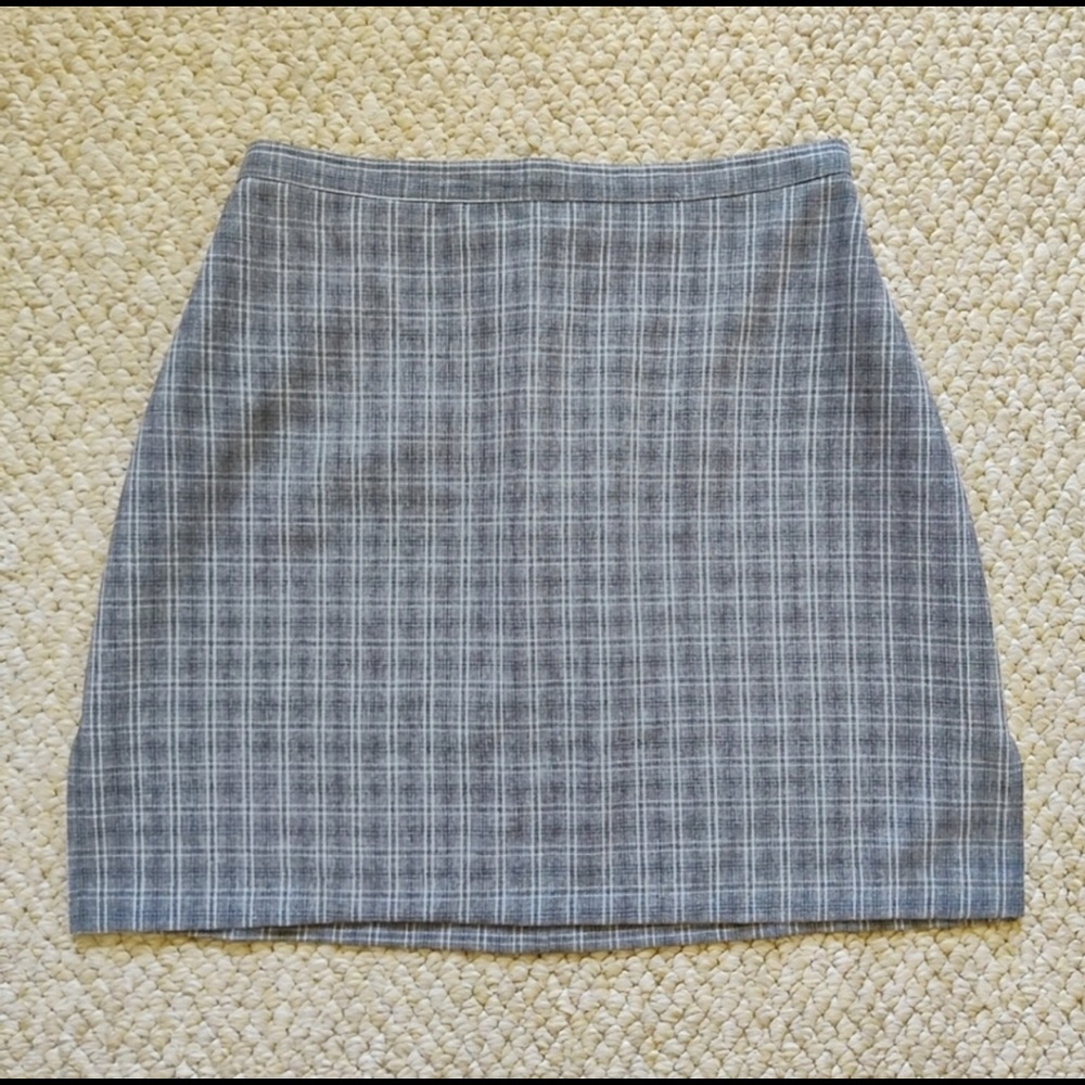 Pair of vintage 90s plaid and camo mini skirts